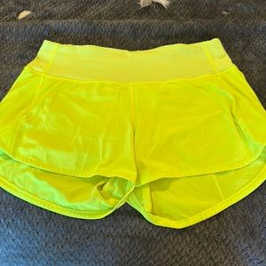 Highlight Yellow speed up shorts midrise